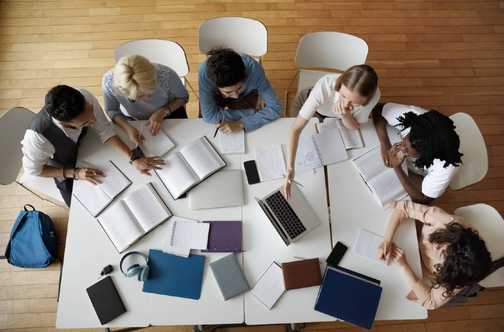 Students in a classroom setting, highlighting how a university marketing agency crafts targeted campaigns to attract and retain students.