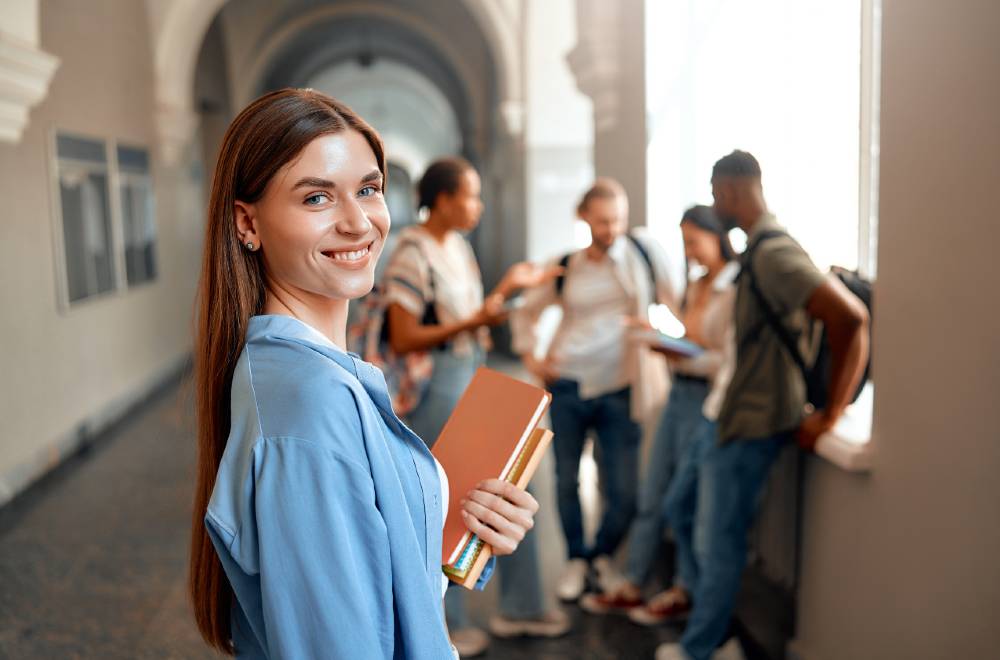 University students standing together on campus, showcasing the impact of Digital Marketing for Educational Institutions in attracting engaged learners.