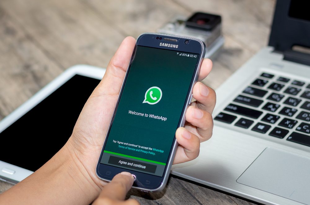 Student using WhatsApp for college inquiry, highlighting WhatsApp automation and digital marketing services for education sector